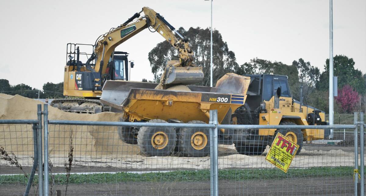 BUSY: Work continues on the two new sports fields along Hereford Street. Photo: CHRIS SEABROOK 040622cfields2