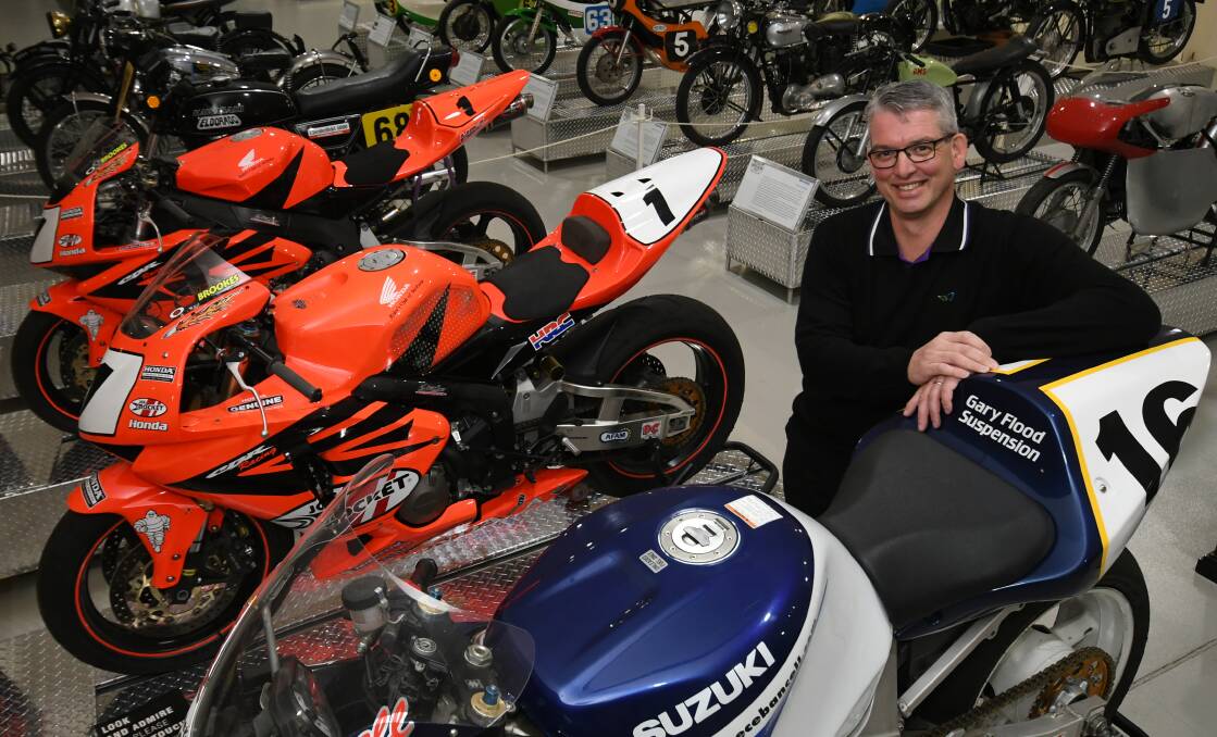 DAD'S DAY OUT: National Motor Racing Museum coordinator Brad Owen ahead of free entry for dads on Father's Day this Sunday. Photo: CHRIS SEABROOK