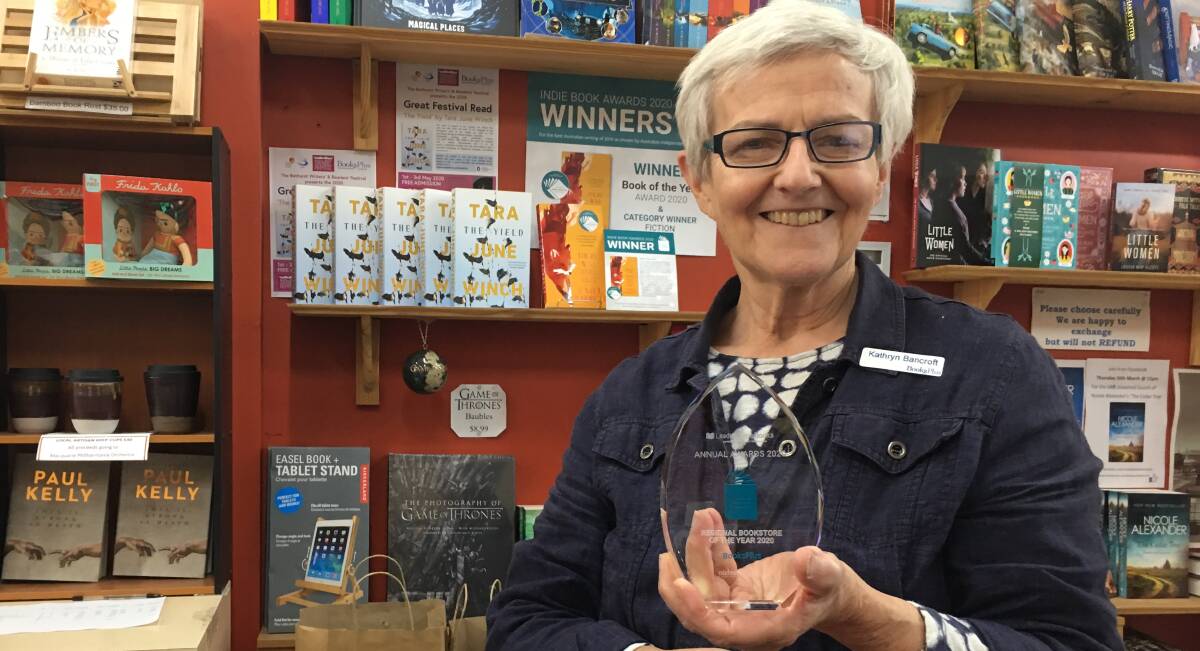 WINNER: BooksPlus owner Kathryn Bancroft with the 2020 Leading Edge Books Regional Bookstore of the Year. Photo: BRADLEY JURD