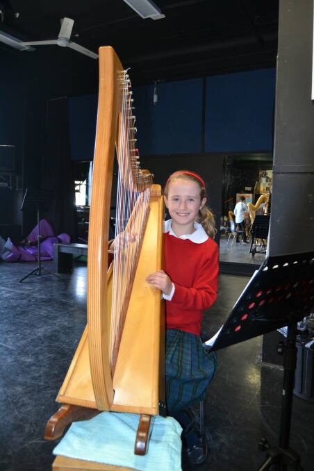 TALENT: All Saints' College year four student Imogen Ellis. She is one of Bathurst High Campus teacher Bethany Carter's harp students. Photos: BRADLEY JURD
