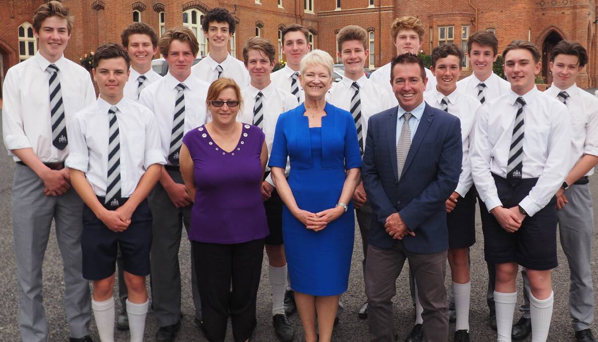 TRIP OF A LIFETIME: Member for Bathurst, Paul Toole, with Stannies students and head of college Dr Anne Wenham and head of history Stella King.