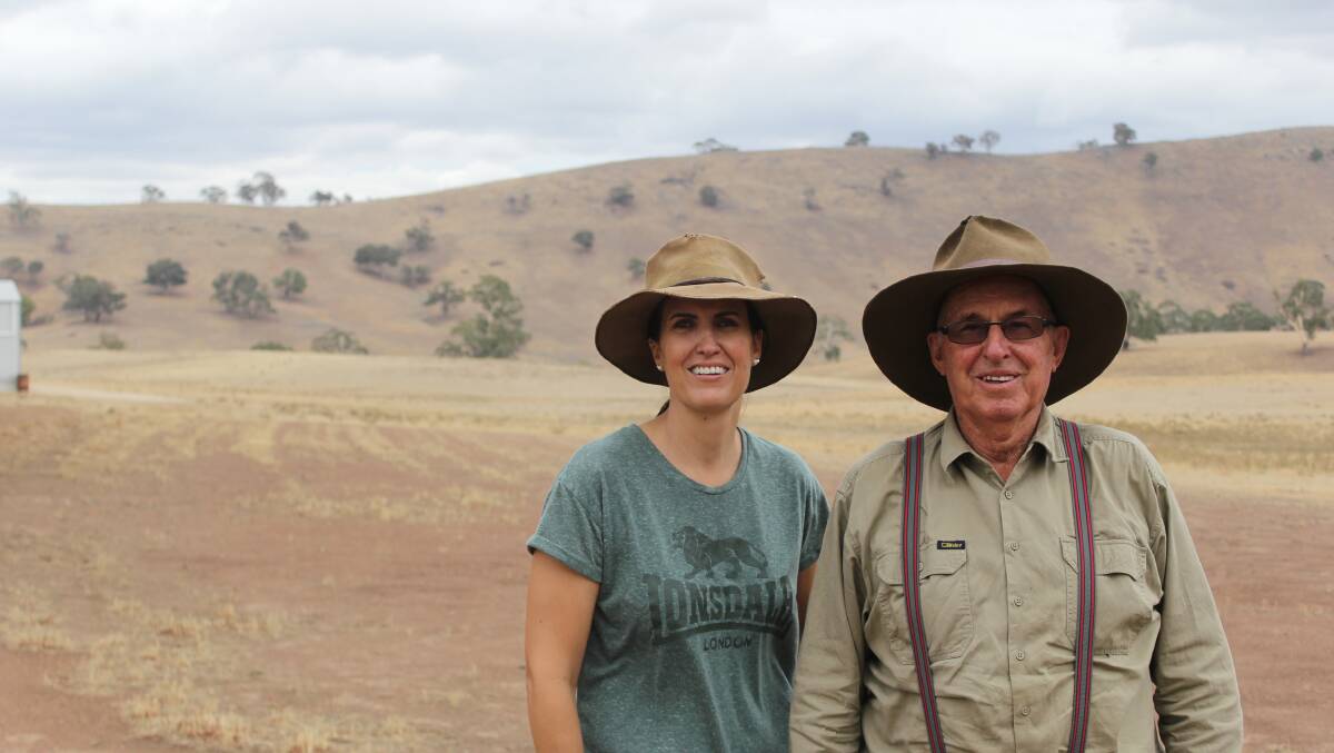 BRING THE RAINS: Katrina Kleinschafer and her father Tony Toole will be hoping upcoming rain will set in and help water crops, fill dams and have rivers running again. Photo: BRADLEY JURD