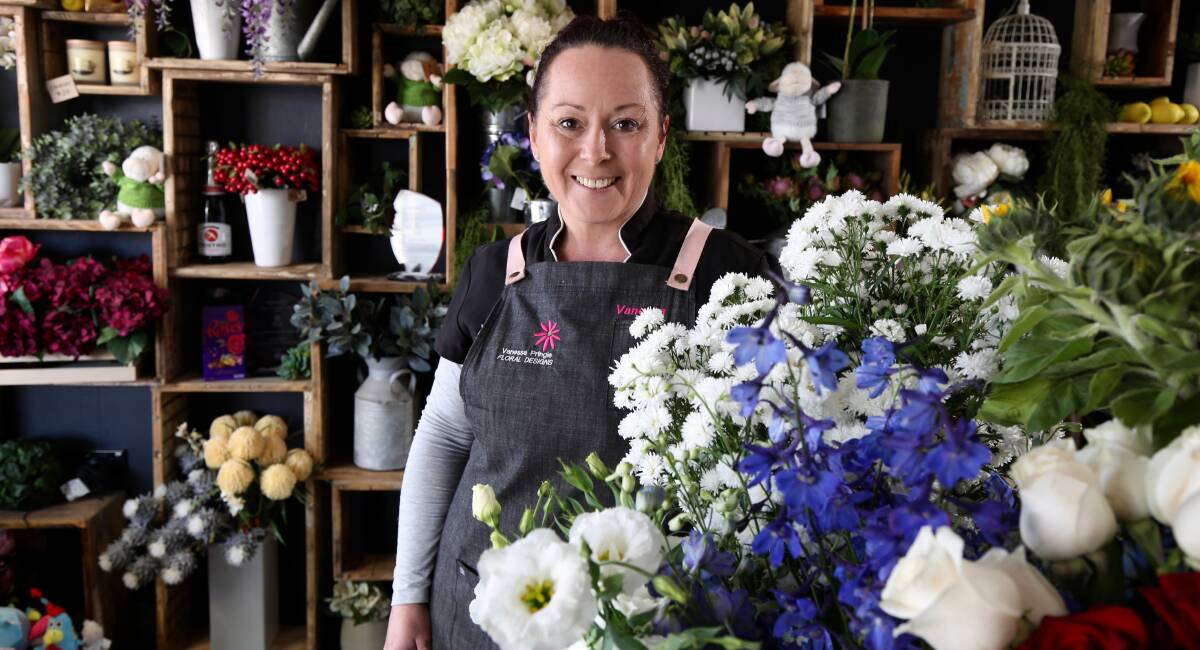 WE'RE STILL OPEN: Vanessa Pringle, of Vanessa Pringle Floral Designs, with some of her flowers on offer. Photo: PHIL BLATCH