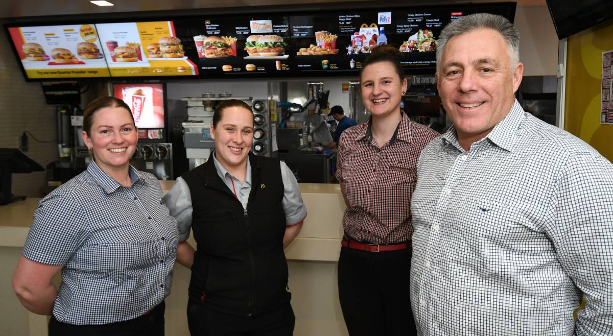 HAPPY BIRTHDAY: McDonald's people performance manager Pamela Dark, assistant restaurant manager Genevieve Horton, restaurant manager Cassandra McLeish and franchise owner Todd Bryant. Photo: CHRIS SEABROOK