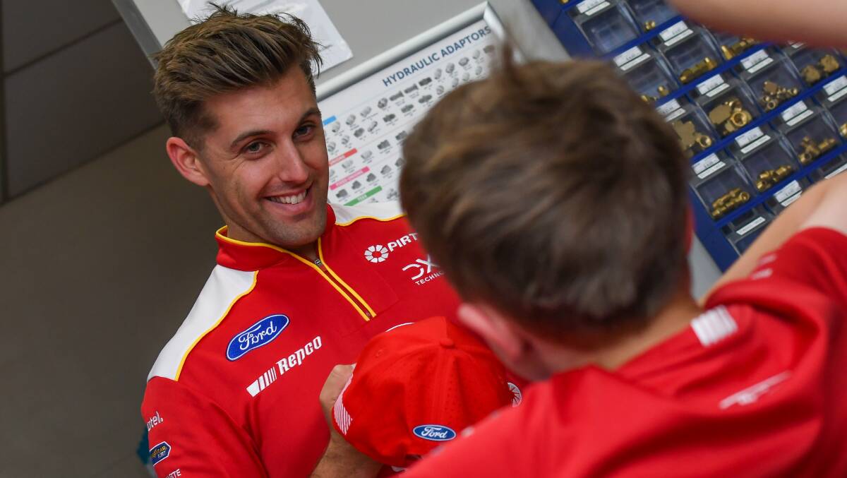 Anton de Pasquale meets a young fan at a signing session at Pirtek Bathurst on Tuesday afternoon. Picture by James Arrow