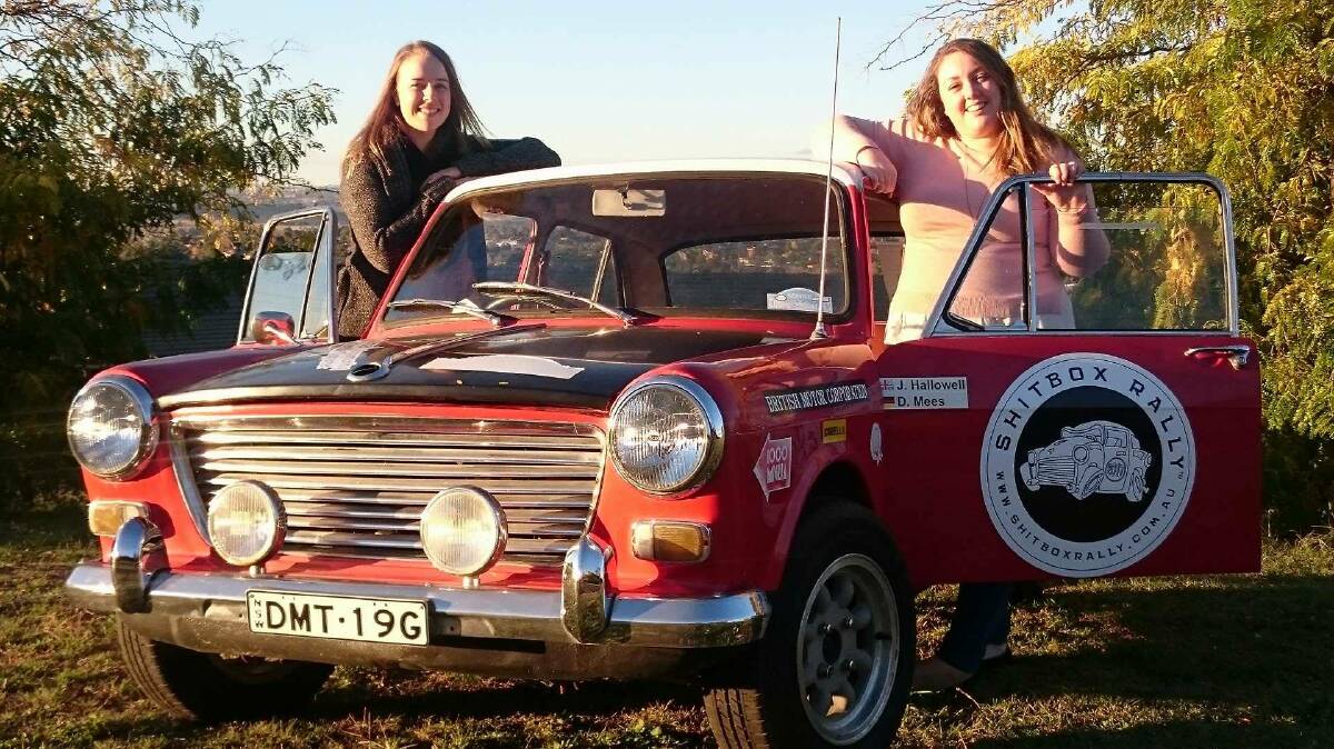 RALLY: Alicia Jeffree and team partner Hannah McCauley, with the Morris 1100 car, called Gordon, which will make the 3800-kilometre trip from Adelaide to Cairns. Photo: SUPPLIED