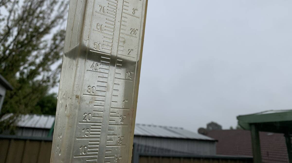 A rain gauge showing how much rain it received from an overnight downpour. Picture by Rachel Chamberlain