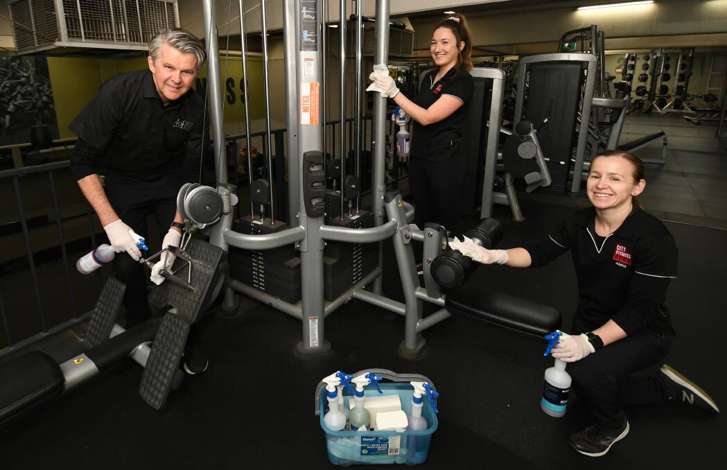 CHANGES: Cityfit owner Mark Simons, with Tori Whitla and Alisha Atkinson. New rules will be introduced to NSW gyms and fitness centres from August 1, requiring a COVID Safe Plan and a hygiene officer. Photo: CHRIS SEABROOK