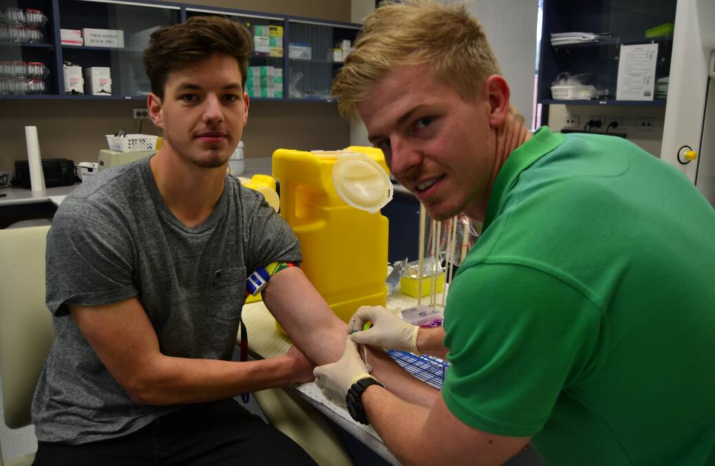 ON THE RISE: CSU student Daniel Plicha, with PHD student Blake Collins. Current research indicates there's a higher rate of diseases amongst shift workers. Photo: BRADLEY JURD