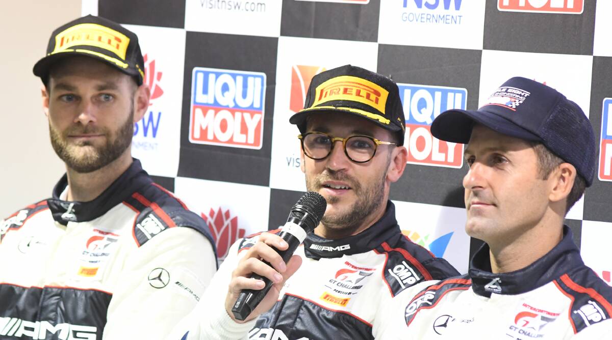 THIRD: #888 Mercedes-AMG drivers Shane van Gisbergen, Maximilian Goetz (with microphone) and Jamie Whincup after the Bathurst 12 Hour. Photo: CHRIS SEABROOK