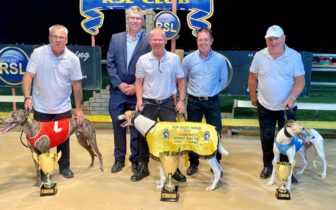 QUICK RACE: Second place Winlock On Top and Raymond Dixon, GBOTA director Damian Harris, Bathurst Gold Cup winner Zulu Warlord and Michael Hardman, Bathurst MP Paul Toole and third place Fire On Ice and Mark Maroney. Photo: CONTRIBUTED