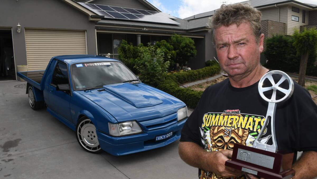 PRIDE AND JOY: Danny Board with his trophy for second place in top ute pickup category at the 2018 Summernats. Photo: CHRIS SEABROOK 