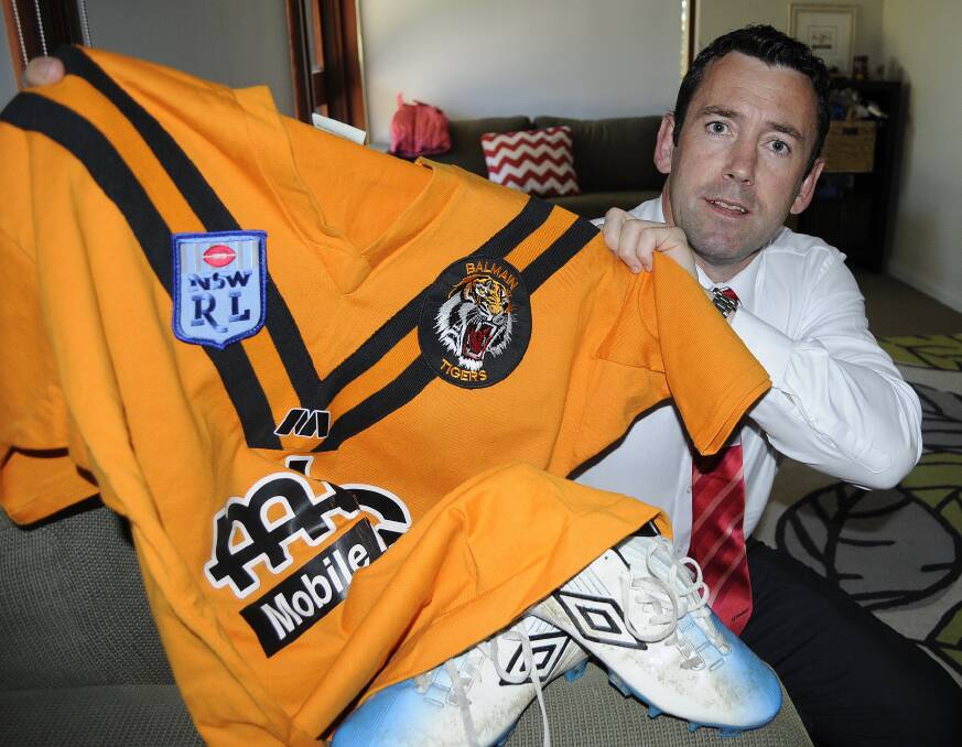 FLASHBACK: Former St Pat's president Dave Chapman with his old Balmain Tigers jersey. He's excited for the changes to the points cap to Group 10. Photo: CHRIS SEABROOK