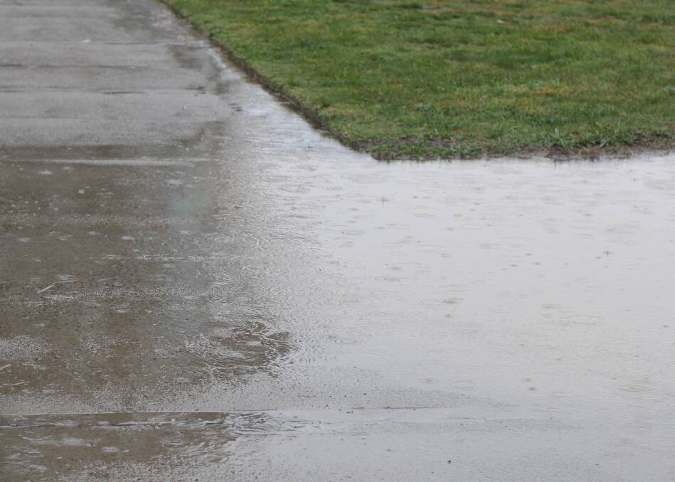WET: Paths have been covered by water thanks to the rain.