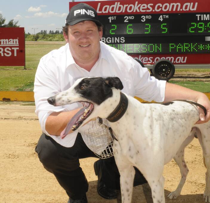 WINNERS ARE GRINNERS: Shayne Hannaford with winning dog Vast at Kennerson Park, on Monday afternoon. Photo: CHRIS SEABROOK 112816cdogs2