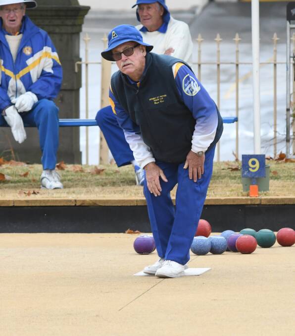 BOWLS: Bruce Rich studies the travel of his bowl in a game of social bowls at the Bathurst City Community Bowling Club. Photo: CHRIS SEABROOK 060918cbowls5