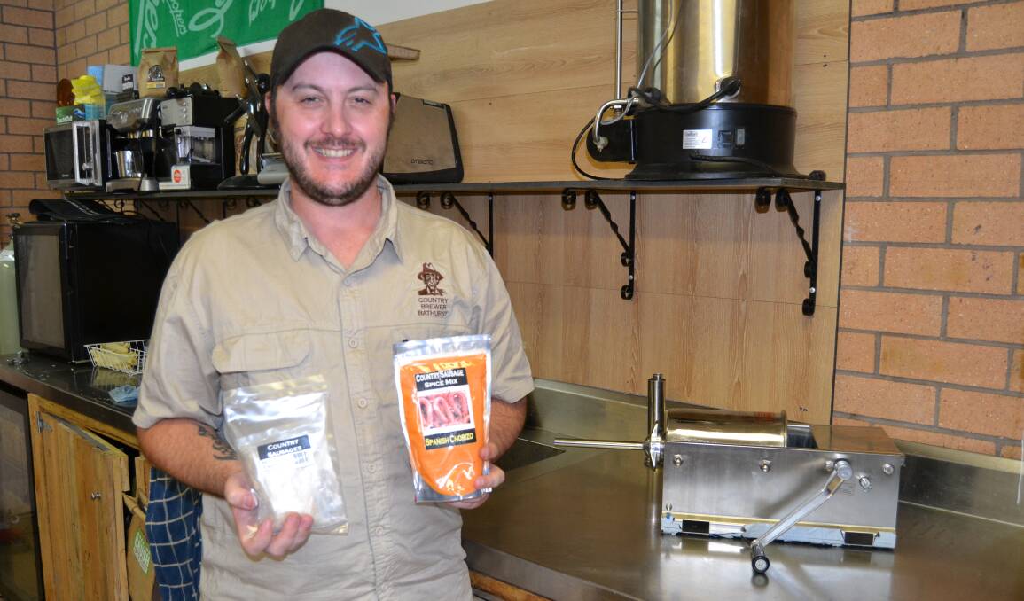 GRATE IDEA: Country Brewer Bathurst owner Matt Gildon will be hosting a sausage and cheese making demonstration on January 20. He is pictured with a sausage making machine and kit ingredients. Photo: BRADLEY JURD
