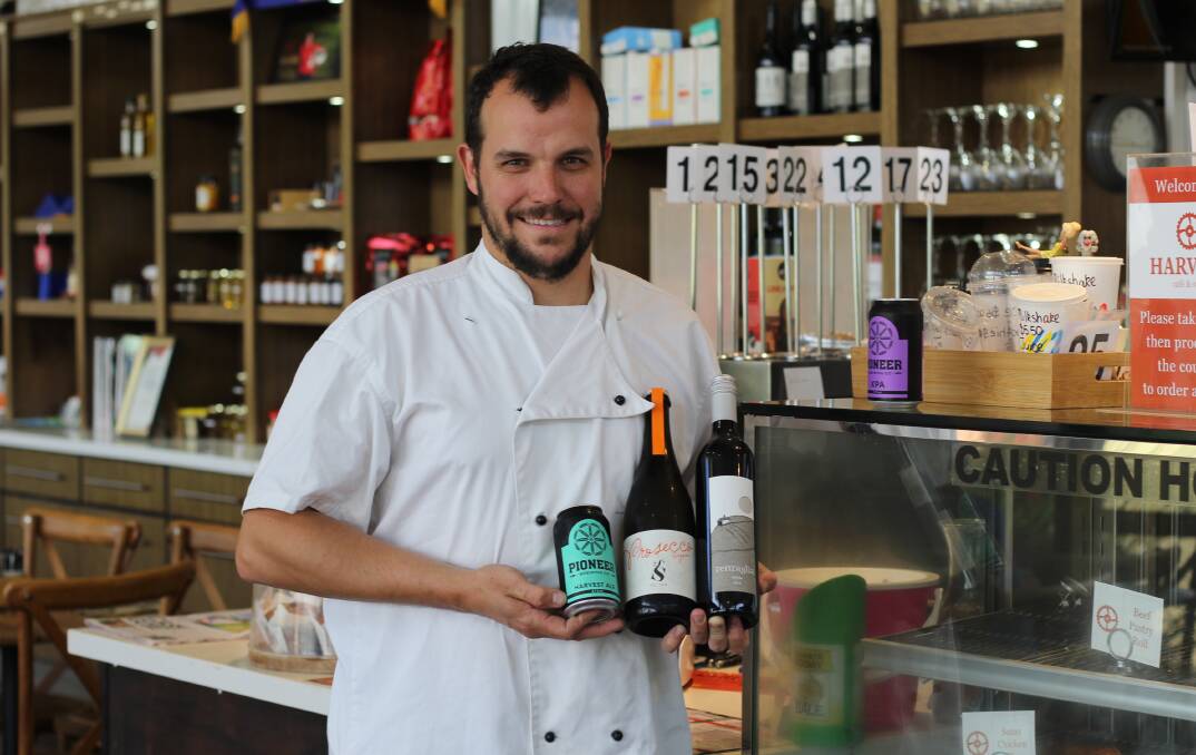 ROCK ON: Harvest Cafe head chef and co-owner Chris Ringrose with some local beverages that will on offer at a four-hour food and drink package during the Elton John concert in January. Photo: BRADLEY JURD