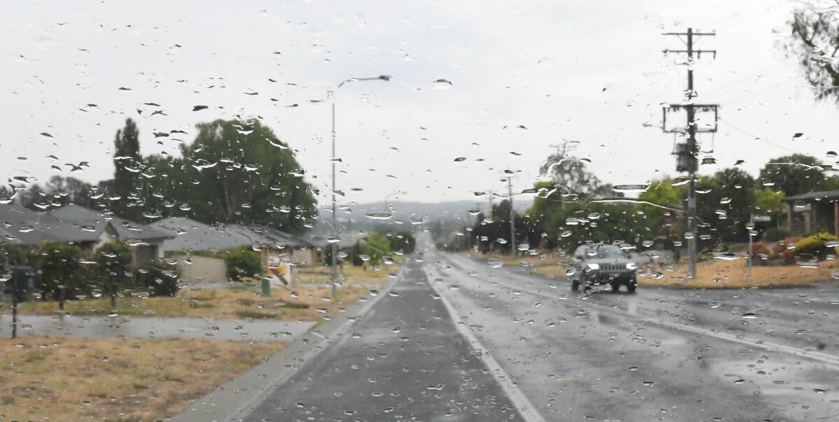 BRING IT On: Motorists' windscreen wipers were operating again on Tuesday morning, after some light falls of rain. Rain was widespread across the Central West. Photo: CHRIS SEABROOK 010720cwet5