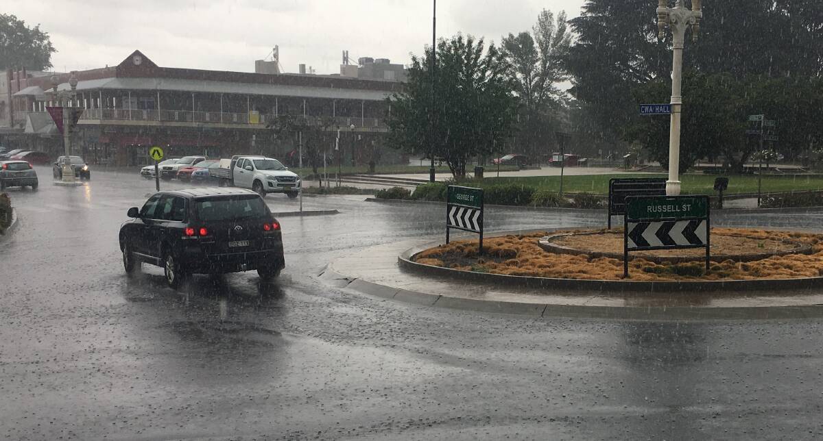 LET IT FALL: Rain was falling heavily in Bathurst in the early afternoon on Thursday. Photo: BRADLEY JURD