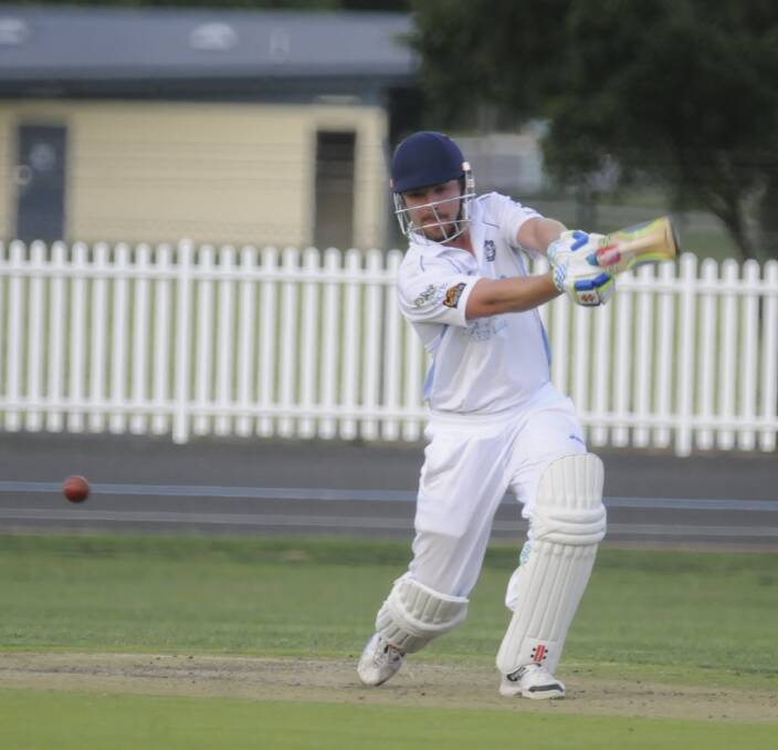 BIG SWING: City Colts batsman Pat Mills lines up a ball from the ORC bowlers on November 19 at the Bathurst Sportsground. Photo: CHRIS SEABROOK 111916colts2a
