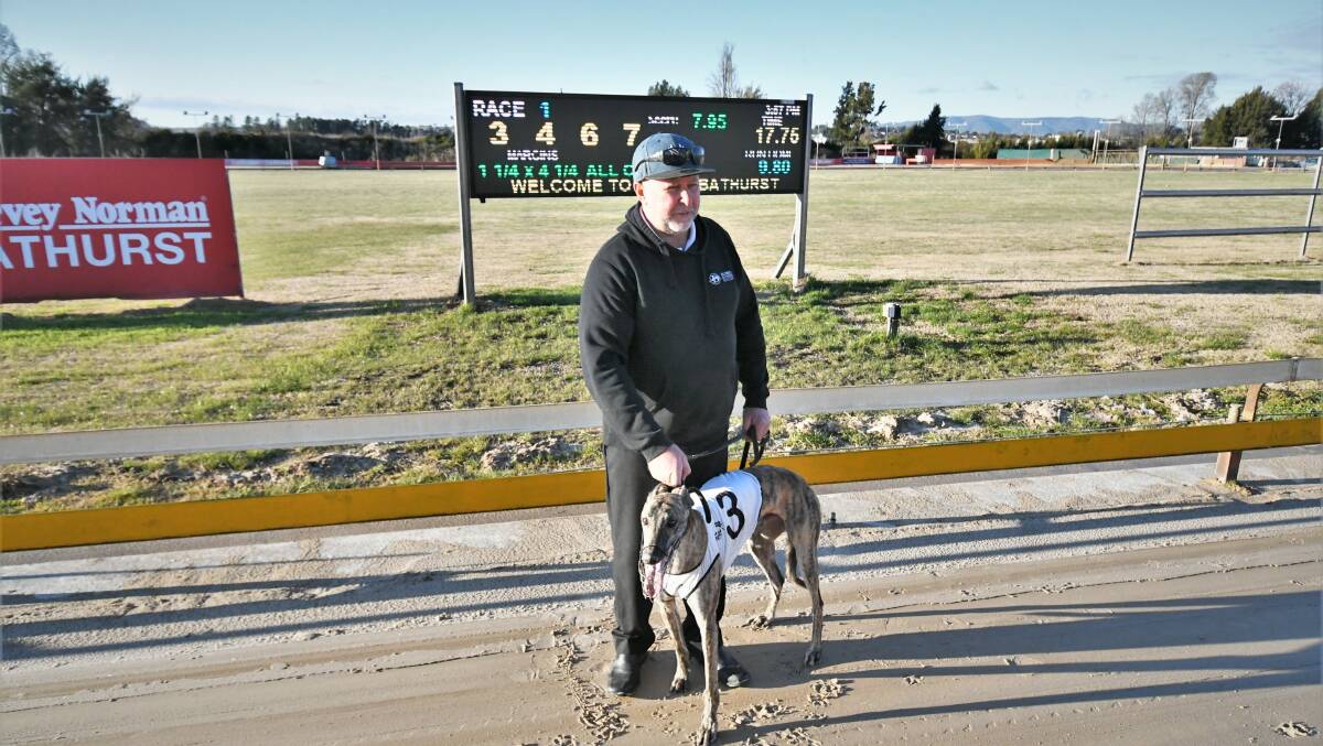 WINNER: Molong trainer Gus Weekes with Winlock Moment, who won the opening race at Kennerson Park on Monday afternoon. Photo: CHRIS SEABROOK 061421cdogs2