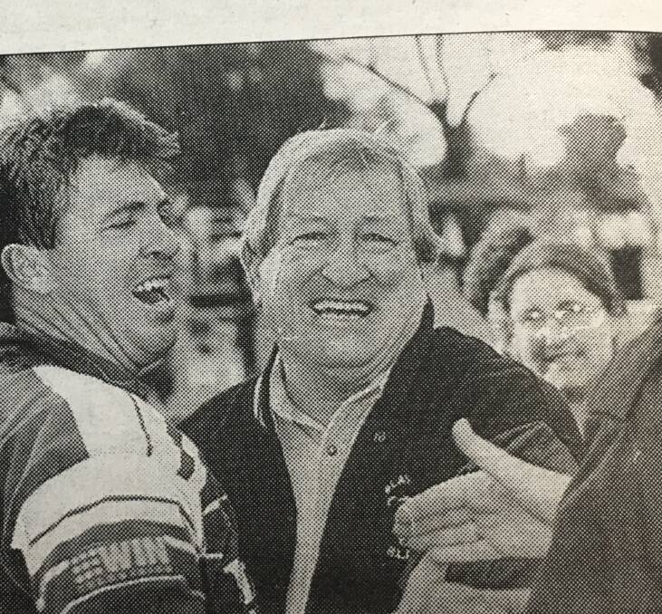 Blayney coach John Davis embraces outgoing Bears veteran Steve Mooney after the 1996 decider. 