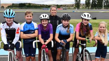 Erica Blake, Sebastian Gallagher, Hallie Allen, Toiresa Gallagher, Jenna Gallagher, Sienna Allen and Nadia Gallagher at the Bathurst Cycling Club's headquarters on Vale Road, ahead of the Central West Track Open. Picture by Bradley Jurd