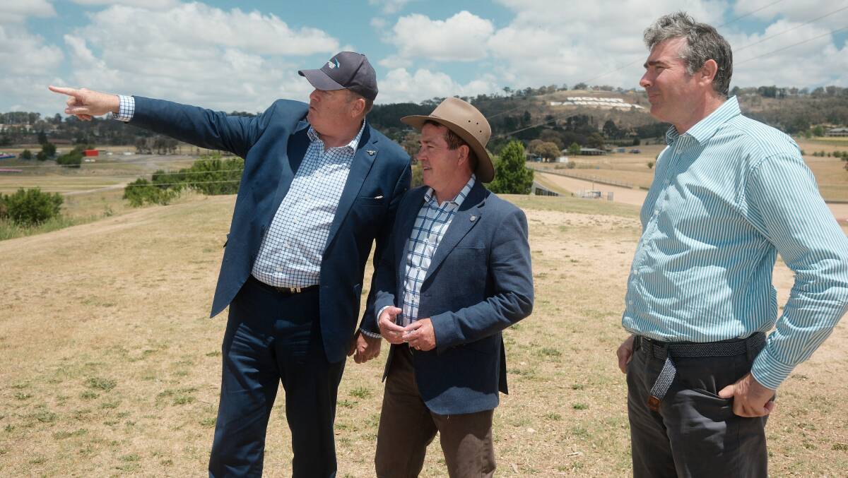 Greyhound Racing NSW CEO Rob Macaulay, Bathurst MP Paul Toole and Greyhound Breeders, Owners and Trainers Association NSW's then-interim boss Daniel Weizman survey a potential parcel of land that could host a greyhound racing centre of excellence during a visit in November 2023. Picture by James Arrow
