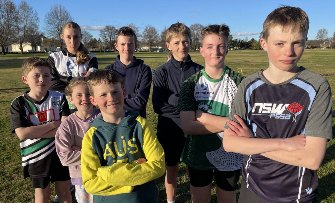 PETITION: Bathurst Little Athletics Club members (back): Thalia Ruming, Kobe Borgstahl, Dylan Ruming, Byron Rosier and Will Curtin. Front row is Hayden Grimm, Jemima Sellers and Xavier Curtin. Photo: BRADLEY JURD