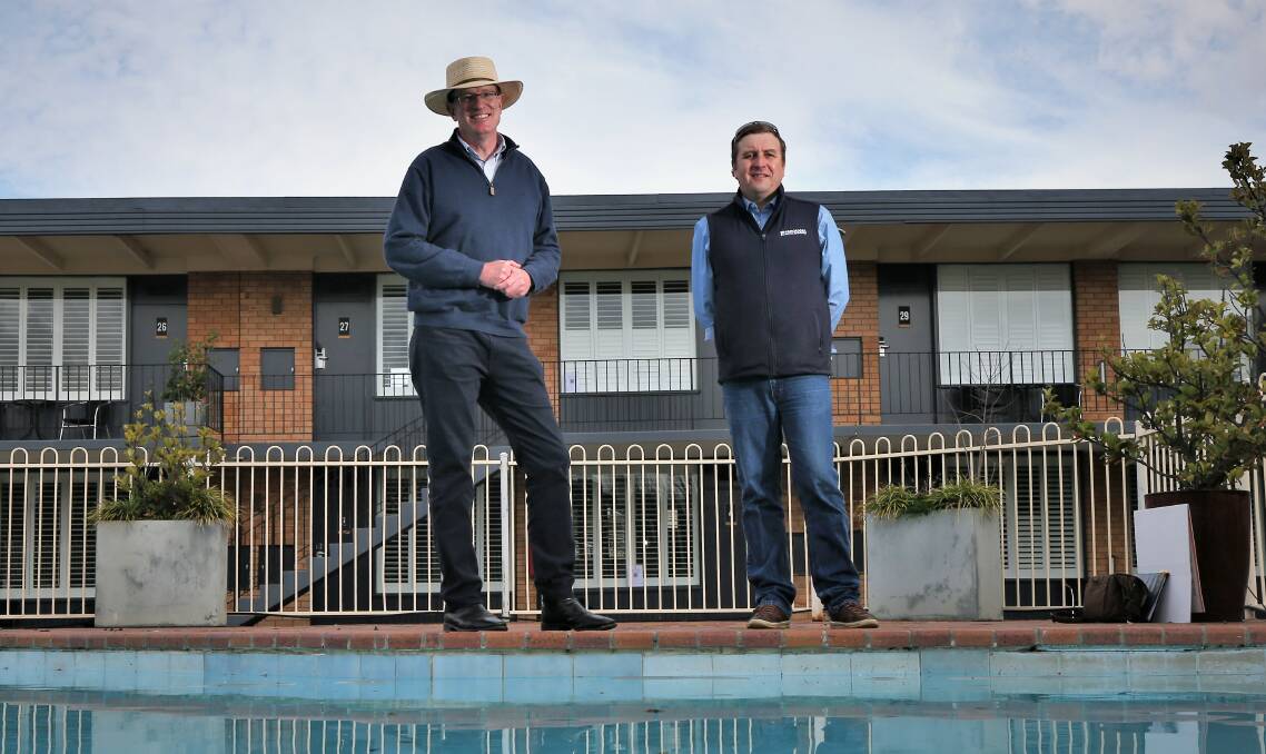 FUNDING BOOST: Member for Calare Andrew Gee and Panorama Motel general manager Tim Fagan. Photo: PHIL BLATCH