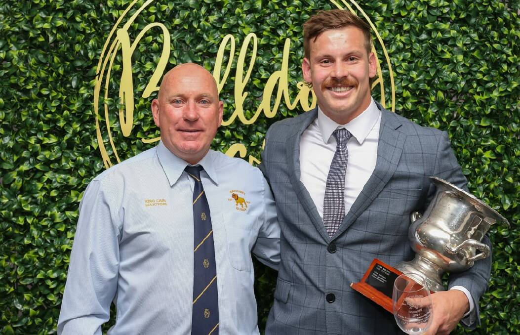 HONOUR: Bathurst Bulldogs coach Dean Oxley, with first grade best and fairest Adam Plummer at the club's recent awards night. Photo: TIM HULME