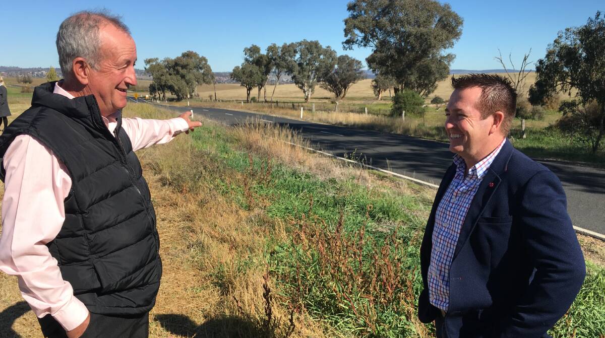 UPGRADE: Bathurst mayor Bobby Bourke with Bathurst MP Paul Toole near the section of Sofala Road that is set to be upgraded.
