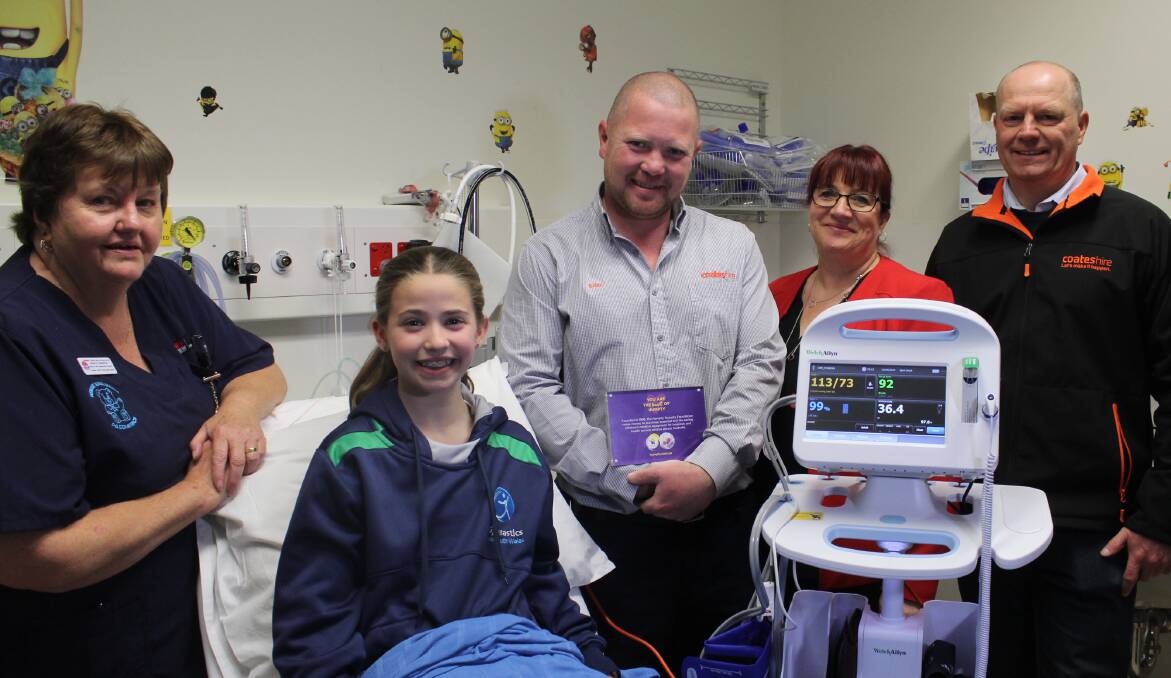 NEW DEVICE: Paediatrics manger Shirley Roberts, Shayla Winwood-Smith, Coates Hire's Brian Bell, director of nursing and midwifery services Tracy Wittich and Coates Hire's Paul Brittain with the new Connex Vital Signs Monitor. 