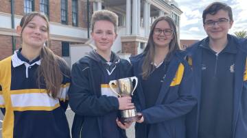 WINNERS: Sidney Speers, Thomas Brennan-Newton, Olivia Daley and Samuel Blencowe with the Mulvey Cup trophy after their win. Photo: BRADLEY JURD