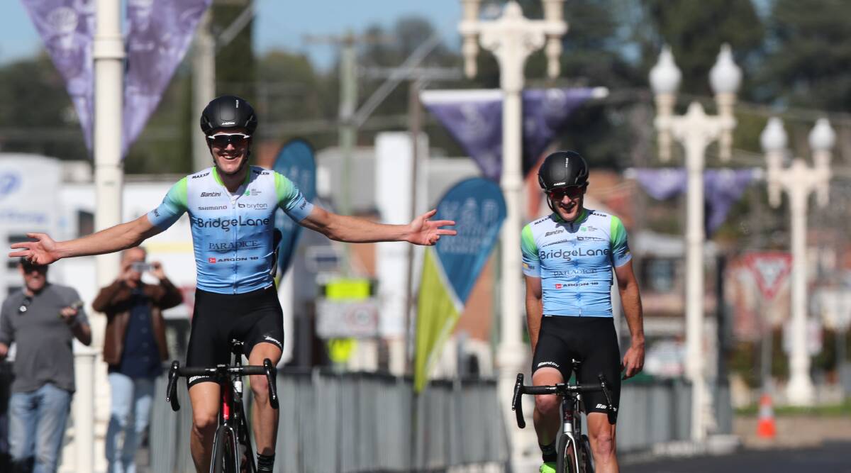 BROTHERLY LOVE: Sam Hill celebrates winning the Bathurst2Bathurst men's 100km long course ahead of his older brother Ben Hill on Sunday morning. Photo: PHIL BLATCH