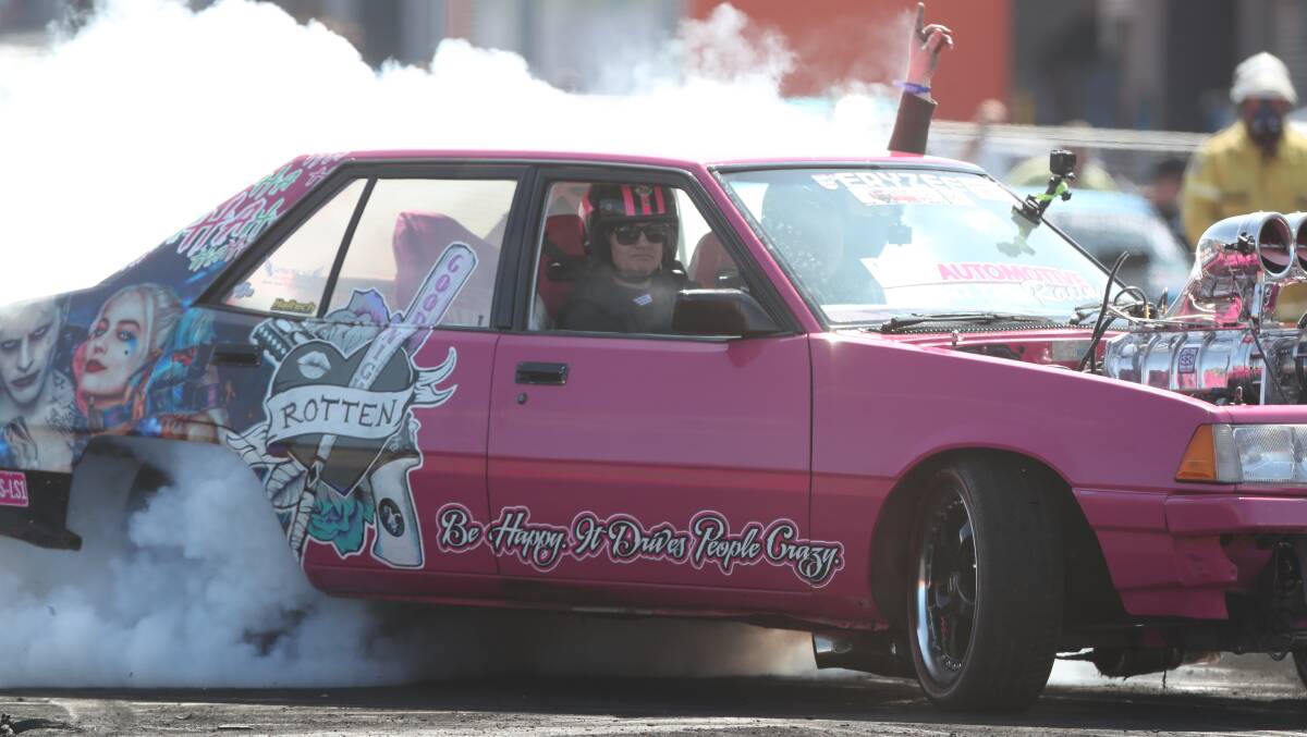BURNOUTS: Sharmaine McDonald of Oberon with son Travis as a passenger in the Autofest burnouts at Mount Panorama last year.
