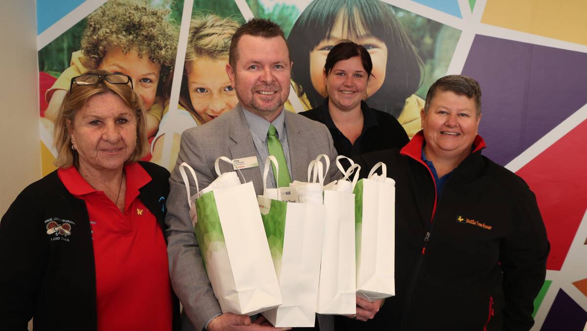HELPING HAND: Bathurst Homelessness and Housing Support Service support worker Lindsay Wallace, team leader Ange Brown and support worker Lindsay Wallace, with St George branch manager Craig McGuire.