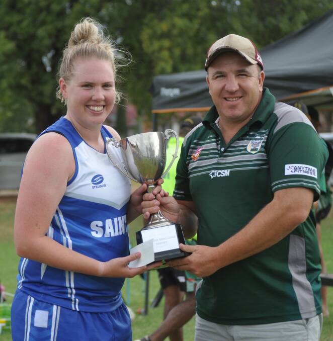 GOING FOR FIVE: Mish Sommers being presented the Western Challenge trophy after winning the 2019 decider against Dubbo CYMS in Canowindra. Photo: NICK MCGRATH
