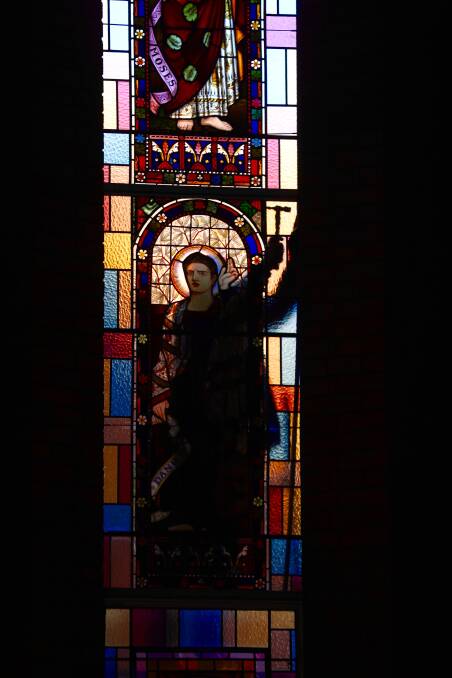 A view of the stained glass window from inside the church. Photo: PHIL BLATCH