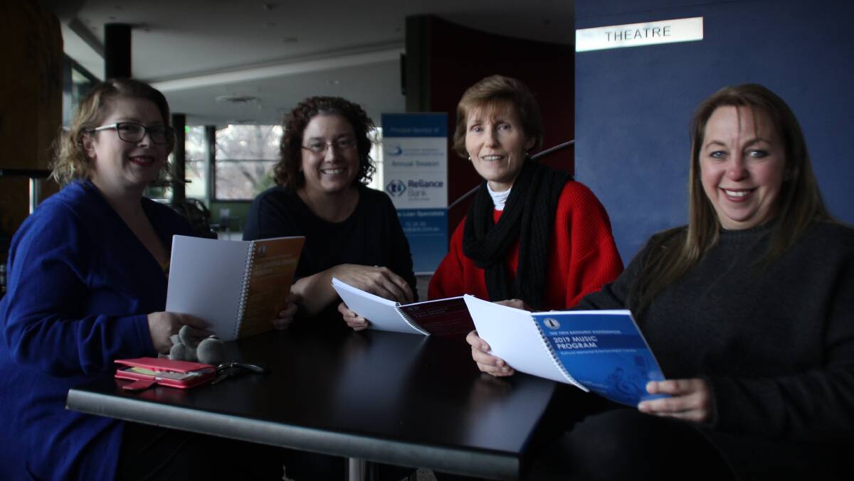 SHOW TIME: Bathurst Eisteddfod committee members Charmaine Nicholls, Renee Fowler, Gwyneth Kelly and Donna Miller with this year's programs. Photo: BRADLEY JURD