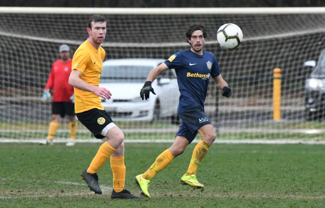 The action from the Bathurst District Football men's premier league match between Abercrombie and Mudgee Wolves. Photos: CHRIS SEABROOK