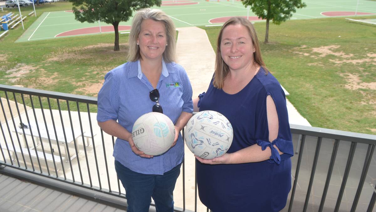 GRANT: Bathurst Netball Association treasurer Karen Miller (left), with president Tina Muller (right). Photo: BRADLEY JURD