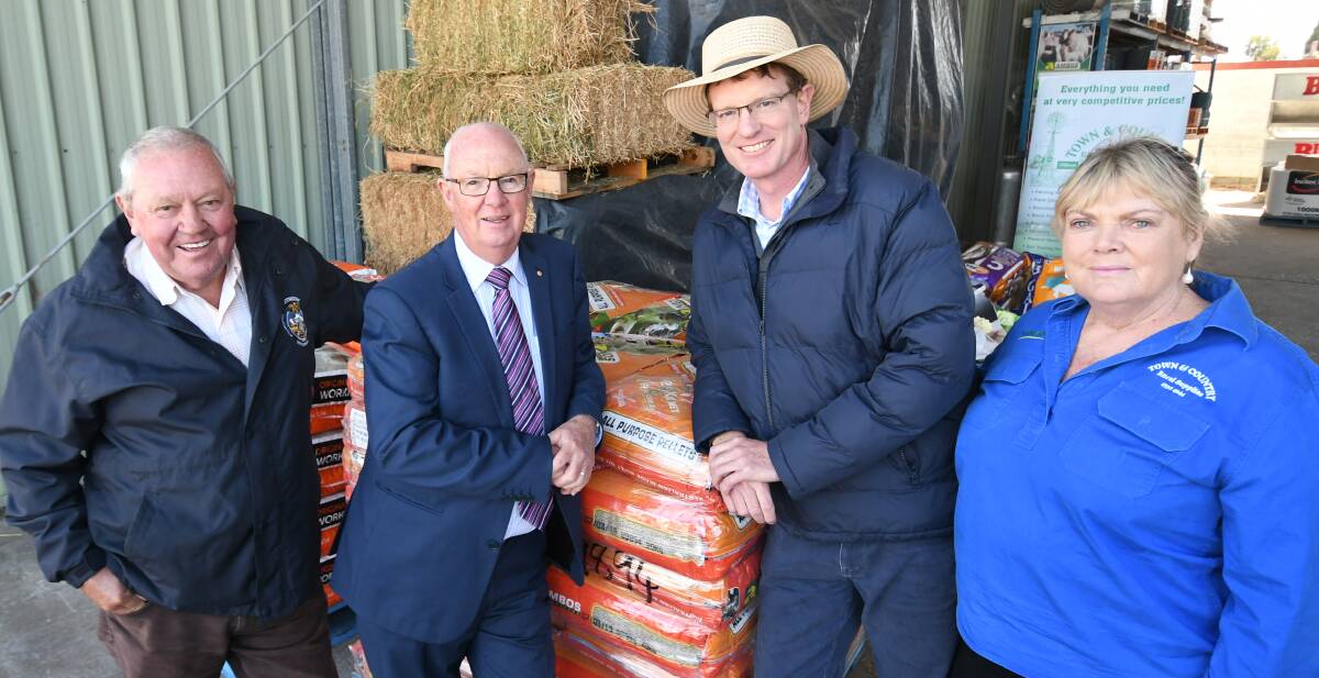 DROUGHT AID: Lithgow mayor Ray Thompson, Bathurst mayor Graeme Hanger, Calare MP Andrew Gee and Town and Country Rural Supplies owner Vicki Wilson at the announcement back in March. Photo: CHRIS SEABROOK 032619cmoney1