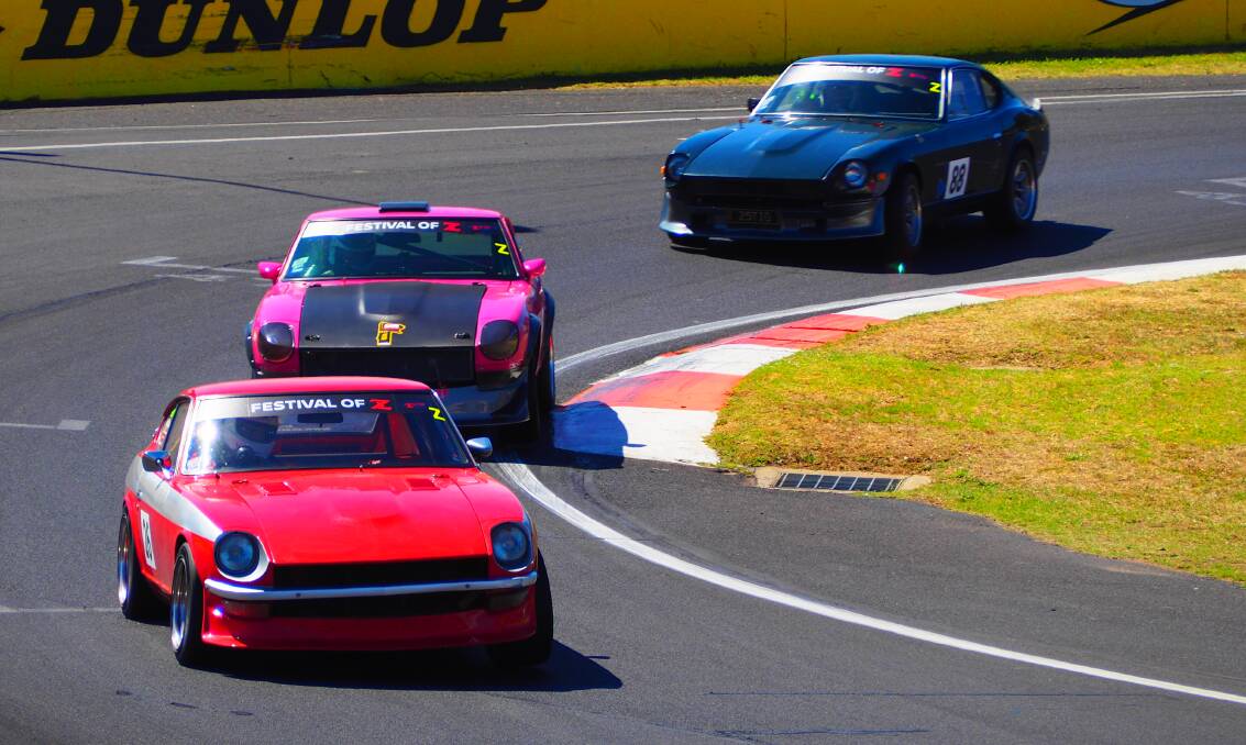 Members of Queensland's Z Car Club steer Datsun 240Z's around Murrays Corner during a previous Challenge Bathurst.