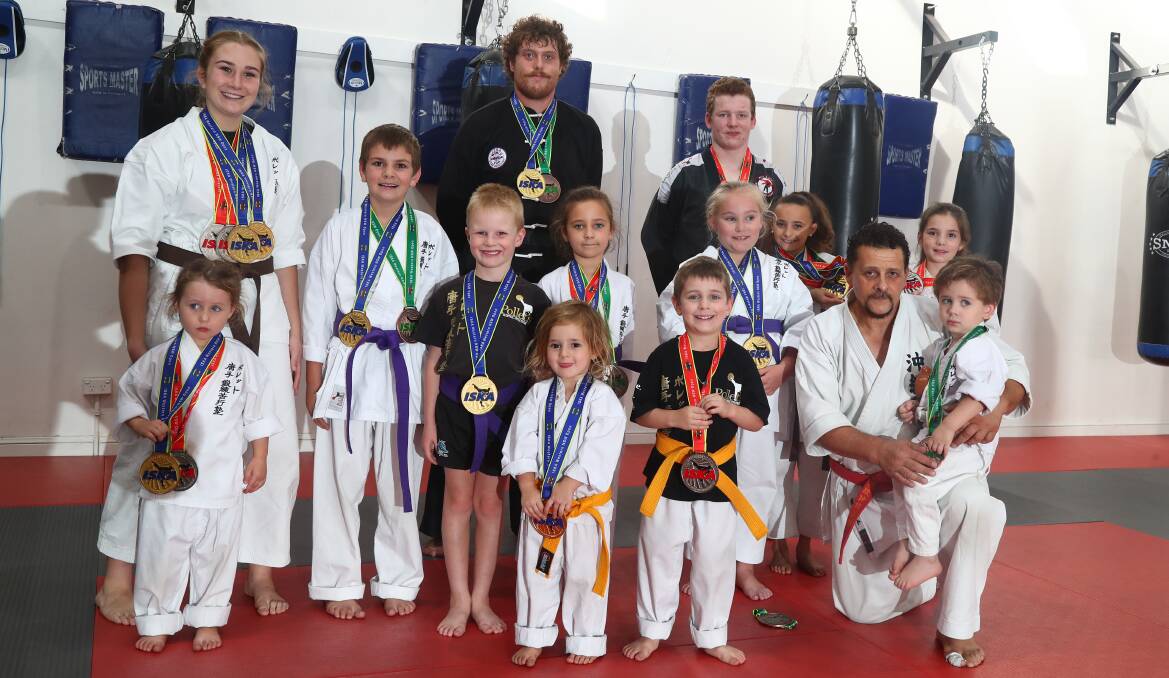 MEDALS GALORE: Bathurst Pollet's Martial Arts Centre students with their medals, from Sunday's ISKA Western NSW Open Martial Arts Championships. Photo: PHIL BLATCH