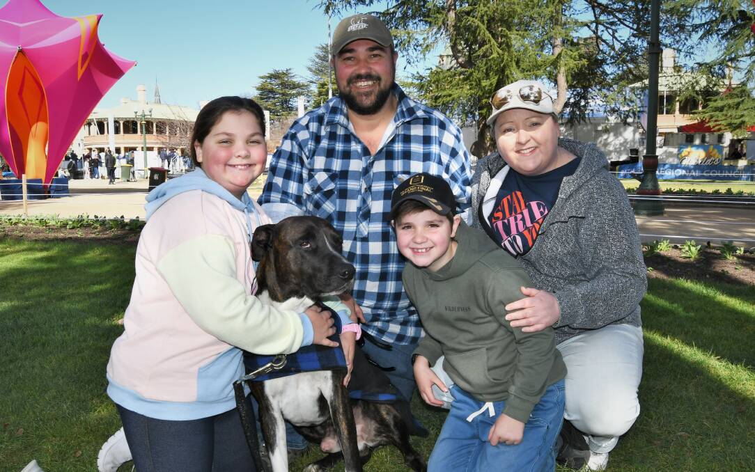 James and Danielle Mitchell with kids Ellie and George and their dog Barney, an Australian Emut. 071722cpets4a