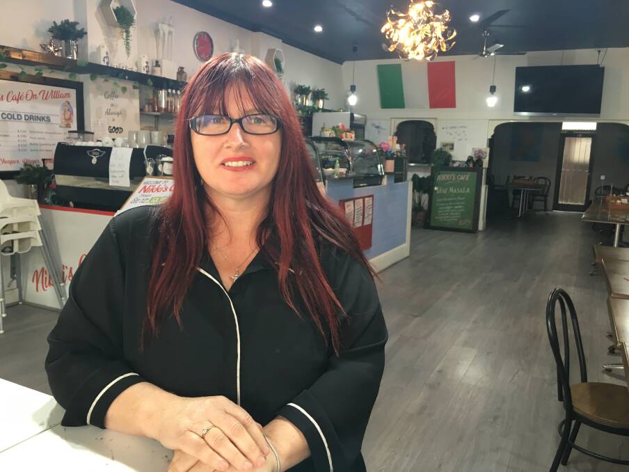 DOORS ARE OPEN: Nikki Calabro of Nikki's Cafe on William says the business remains open and is still taking orders. Photo: BRADLEY JURD