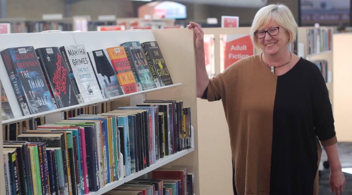 CALL AND COLLECT: Bathurst Library services manager Patou Clerc at the Bathurst Library on Monday. Photo: BRADLEY JURD