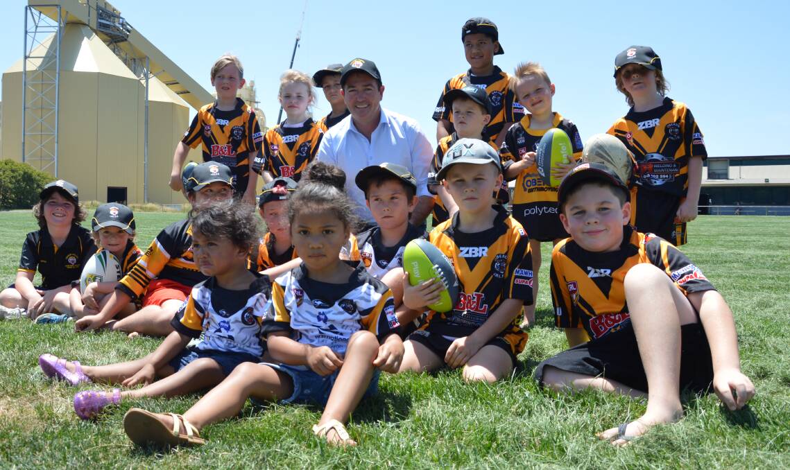TIGER TOWN: Member for Bathurst Paul Toole with junior members of the Oberon tigers, announcing funding for a new digital scoreboard and communications room upgrade. 